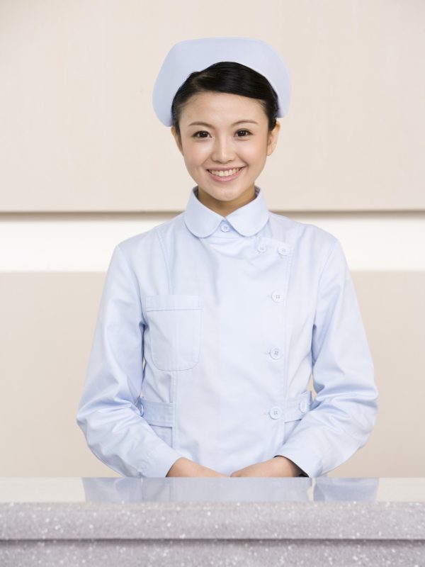 young-nurse-poised-at-nurses-station.jpg